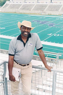 Football practice inside Herndon Stadium at Morris Brown College. Coach Solomon Brannan Jr.