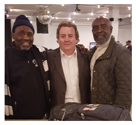 Solomon Brannan with BuccaneersFan Founding Director William Rader and Buccaneer Bobby Howard during 2017 Super Bowl party